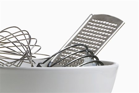rallador - Assorted Kitchen Tools in a Bowl Foto de stock - Sin royalties Premium, Código: 659-03535831