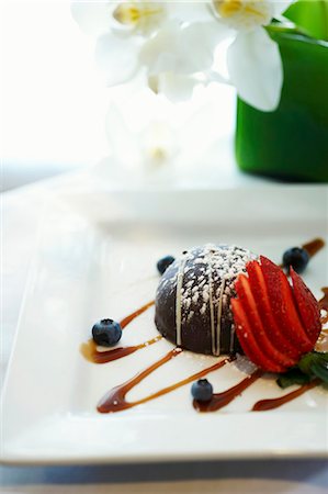 Chocolate Dessert with Strawberries and Blueberries Stock Photo - Premium Royalty-Free, Code: 659-03535876