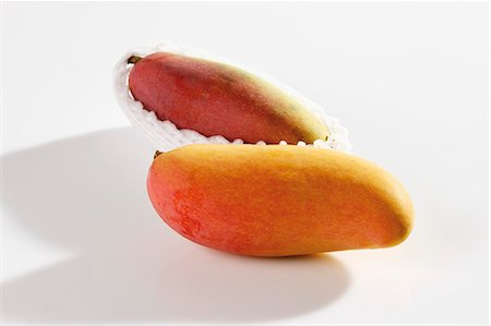 simsearch:659-01854611,k - Two mangos from Thailand Stock Photo - Premium Royalty-Free, Code: 659-03535991