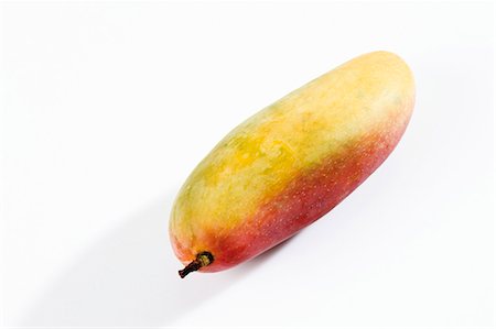 simsearch:659-01846171,k - A mango from Thailand Stock Photo - Premium Royalty-Free, Code: 659-03535993