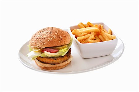 simsearch:659-03531938,k - Burger végétarien avec puces Photographie de stock - Premium Libres de Droits, Code: 659-03536090