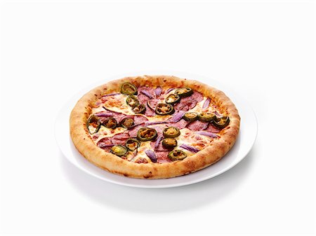 simsearch:659-06155445,k - Salami pizza with jalapeños Stock Photo - Premium Royalty-Free, Code: 659-03536129