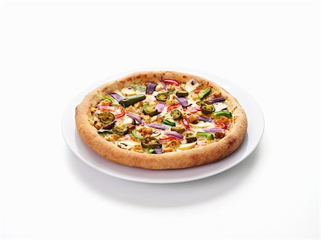 Chicken tikka pizza Stock Photo - Premium Royalty-Free, Code: 659-03536137