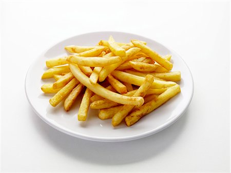 frite (aliment) - Une assiette de frites Photographie de stock - Premium Libres de Droits, Code: 659-03536155