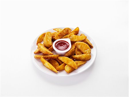 simsearch:659-06903474,k - Potato wedges with dip Stock Photo - Premium Royalty-Free, Code: 659-03536156