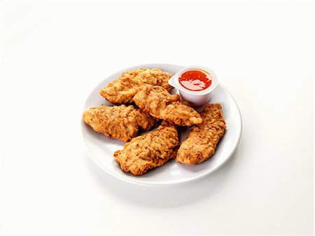 fast food chicken - Chicken goujons with dip Stock Photo - Premium Royalty-Free, Code: 659-03536165