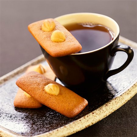 Cinnamon Hazelnut Tea Cookies with a Cup of Tea Stock Photo - Premium Royalty-Free, Code: 659-03536184