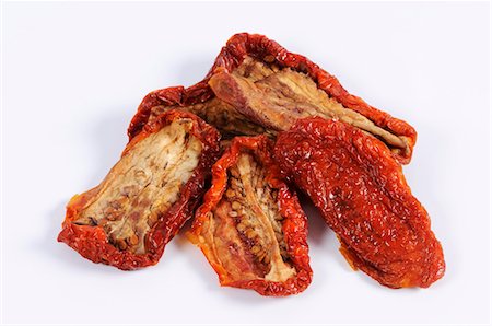 sundried tomato - Dried tomatoes Foto de stock - Sin royalties Premium, Código: 659-03536299