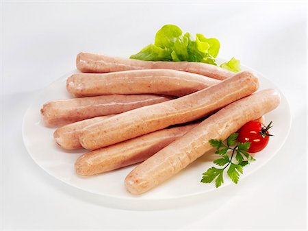 salsichão de porco - Raw Franconian sausages Foto de stock - Royalty Free Premium, Número: 659-03536324