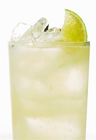 simsearch:659-03536445,k - Vodka Cocktail on the Rocks with Lime Garnish Stock Photo - Premium Royalty-Free, Code: 659-03536444