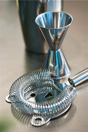 strainer - Bar Tools on Metal Surface Stock Photo - Premium Royalty-Free, Code: 659-03536448