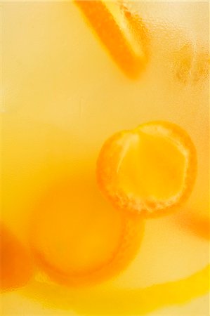 fruit of orange color - Kumquat Garnish in Cocktail Stock Photo - Premium Royalty-Free, Code: 659-03536442