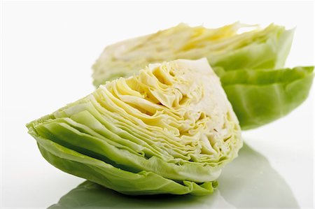 repollo - Pieces of pointed cabbage Foto de stock - Sin royalties Premium, Código: 659-03536526