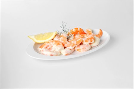 prawn salad - Shrimp salad with lemon wedge Stock Photo - Premium Royalty-Free, Code: 659-03536619