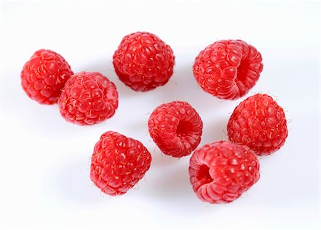 raspberries - Several raspberries Foto de stock - Sin royalties Premium, Código: 659-03536633