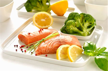 fish fillet - Raw fillet of wild salmon, broccoli, lemon Stock Photo - Premium Royalty-Free, Code: 659-03536673