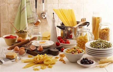 food still life - Pasta still life with tomatoes, flour, eggs, Parmesan Stock Photo - Premium Royalty-Free, Code: 659-03536811