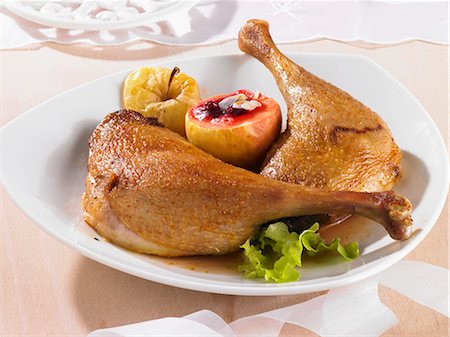 Goose legs with baked apple Stock Photo - Premium Royalty-Free, Code: 659-03537047