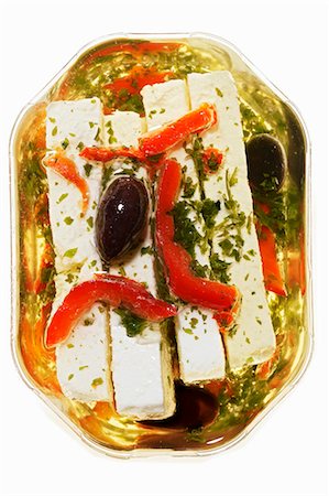 feta - Marinated feta with olives and herbs Foto de stock - Sin royalties Premium, Código: 659-03537058