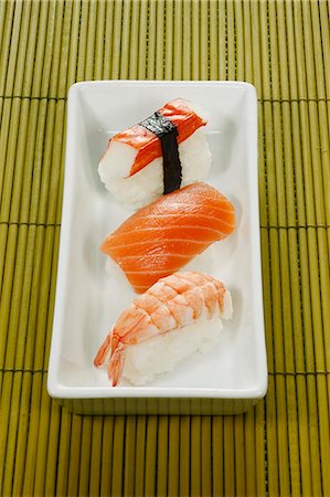 Three nigiri sushi Stock Photo - Premium Royalty-Free, Code: 659-03537161