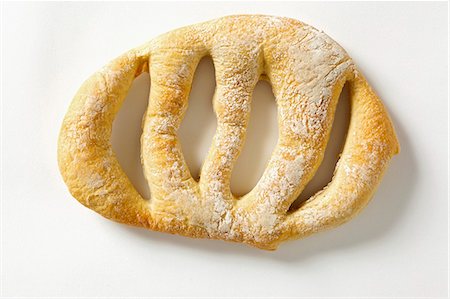 french cuisine - Fougasse (Speciality bread from Provence, France) Stock Photo - Premium Royalty-Free, Code: 659-03537184