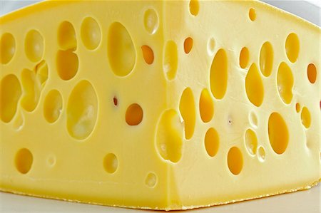 Emmental cheese (close-up) Stock Photo - Premium Royalty-Free, Code: 659-03537189