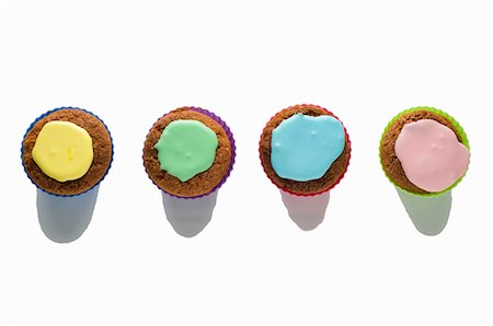 simsearch:659-03534042,k - Four cupcakes Stock Photo - Premium Royalty-Free, Code: 659-03537216