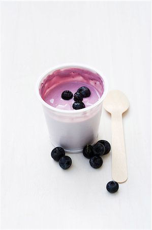 fruits in plastic cups - Blueberry yoghurt in opened pot Stock Photo - Premium Royalty-Free, Code: 659-03537243