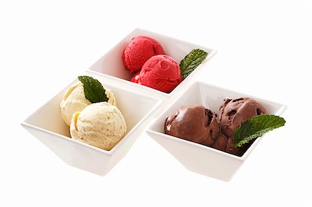 Various flavours of ice cream (chocolate, cherry, vanilla) Stock Photo - Premium Royalty-Free, Code: 659-03537268