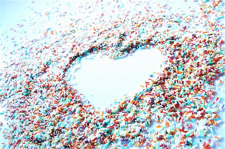 Sprinkles with heart shape Foto de stock - Sin royalties Premium, Código: 659-03537309