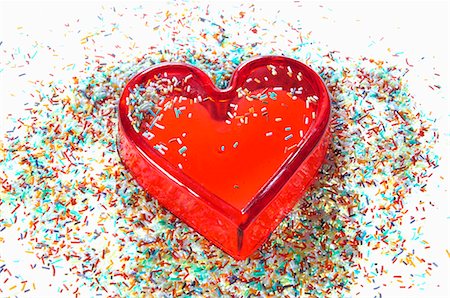 pépite - Sprinkles et moule de coeur Photographie de stock - Premium Libres de Droits, Code: 659-03537310