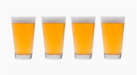 Four glasses of lager side by side Stock Photo - Premium Royalty-Free, Code: 659-03537349