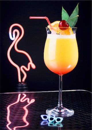 food 1980s - Cocktail in front of neon flamingo light Stock Photo - Premium Royalty-Free, Code: 659-03537500