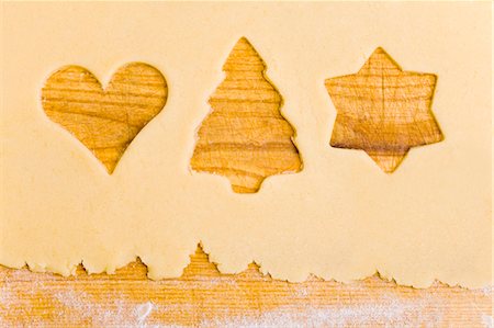 dough - Biscuit dough with the shapes of cut-out biscuits Stock Photo - Premium Royalty-Free, Code: 659-03537604