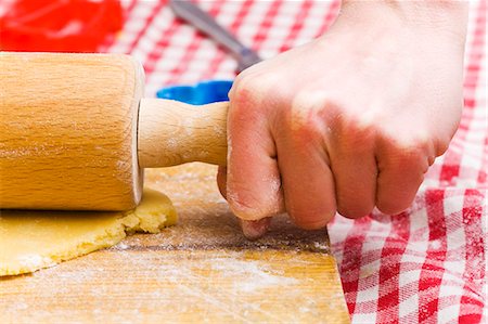 rolling out - Rolling out biscuit dough Stock Photo - Premium Royalty-Free, Code: 659-03537611