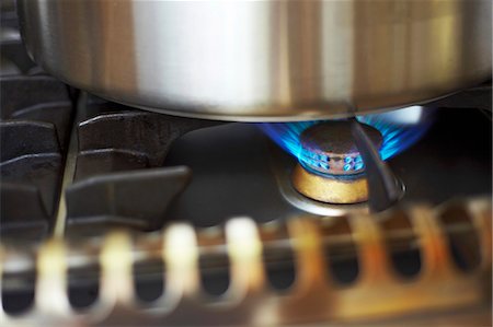 pots on a stove - Burning flame on a gas stove (close-up) Stock Photo - Premium Royalty-Free, Code: 659-03537668