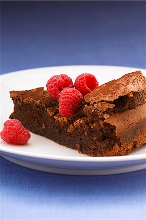 simsearch:659-01849835,k - Piece of (flourless) chocolate cake with raspberries Stock Photo - Premium Royalty-Free, Code: 659-03537679