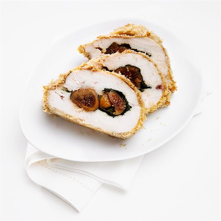 fig dish - Slices of Chicken Stuffed with Figs and Spinach Foto de stock - Sin royalties Premium, Código: 659-03537717