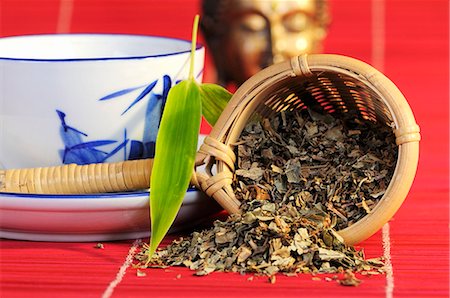 rhubarb roots photography - Rhubarb root in tea strainer with cup of tea Stock Photo - Premium Royalty-Free, Code: 659-03537760