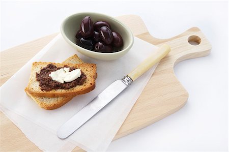 sandwich spread - Tapenade and soft cheese on toast Stock Photo - Premium Royalty-Free, Code: 659-03537850