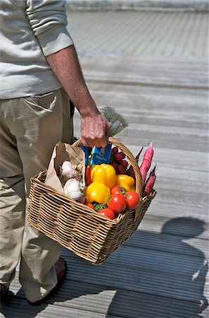 shopping for wine - Man with shopping basket Stock Photo - Premium Royalty-Free, Code: 659-03537928