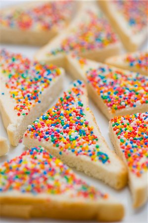 Fairy bread (Bread triangles topped with sprinkles, Australia) Stock Photo - Premium Royalty-Free, Code: 659-03530026