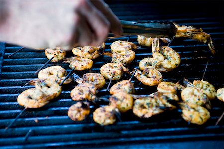 shrimp kebab - Prawn skewers on a barbecue Foto de stock - Sin royalties Premium, Código: 659-03530032