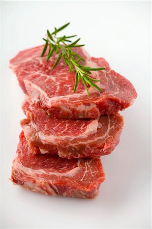 raw beef - Beef with rosemary Stock Photo - Premium Royalty-Free, Code: 659-03530127