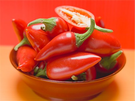 Red chillies in a red dish Stock Photo - Premium Royalty-Free, Code: 659-03530257