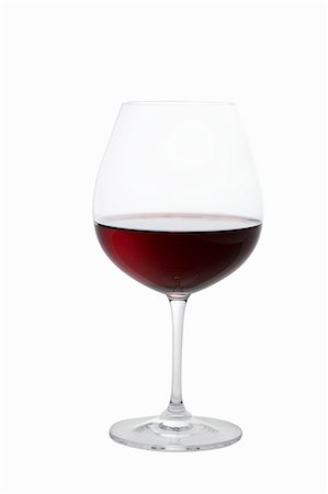 Glass of Red Wine on White Background Stock Photo - Premium Royalty-Free, Code: 659-03530281