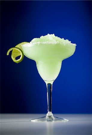 simsearch:659-03524397,k - Frozen Lime Margarita with Lime Garnish Stock Photo - Premium Royalty-Free, Code: 659-03530503