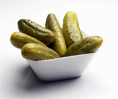 pickled - Pickles in a Square White Bowl Stock Photo - Premium Royalty-Free, Code: 659-03530571