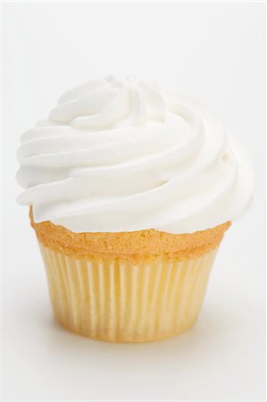 Cupcake with cream topping Stock Photo - Premium Royalty-Free, Code: 659-03530636