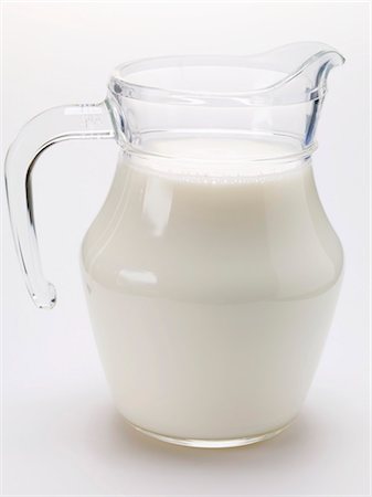 Milk in glass jug Foto de stock - Sin royalties Premium, Código: 659-03530654